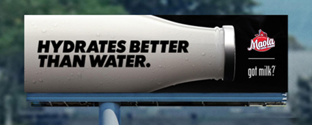 Billboard with Milk Bottle that reads Hydrates Better Than Water